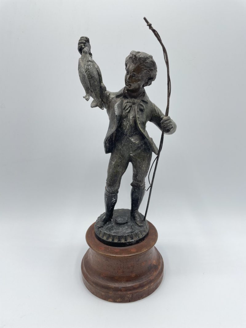 statuette pecheur