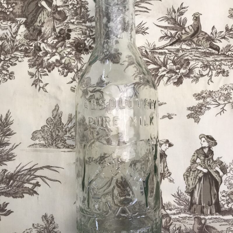 Ancienne bouteille en verre de lait