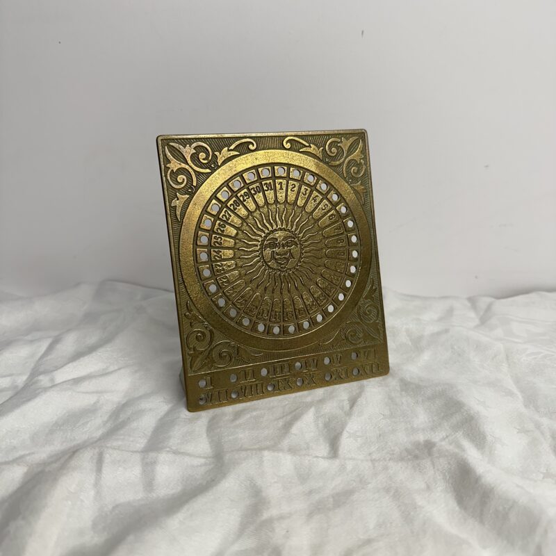 Ancien calendrier perpétuel doré