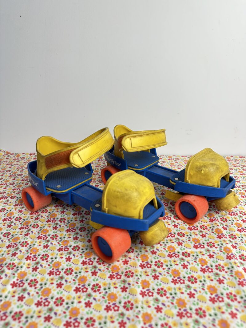 Anciens patins à roulettes Fisher Price vintage années 80