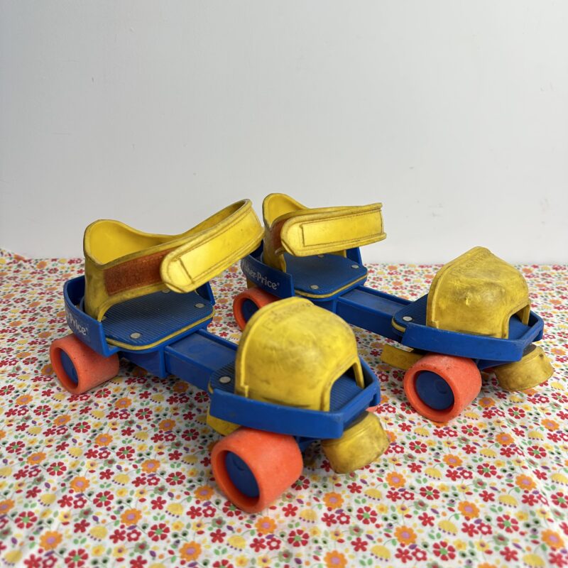 Anciens patins à roulettes Fisher Price vintage années 80
