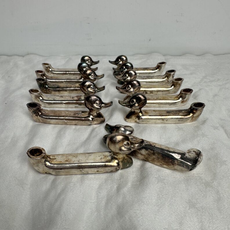 12 porte-couteaux canard en métal argenté